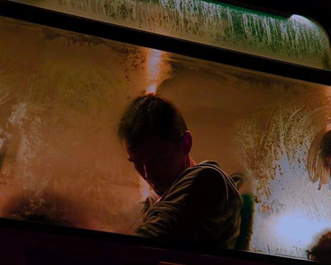 Silhouette of person at window